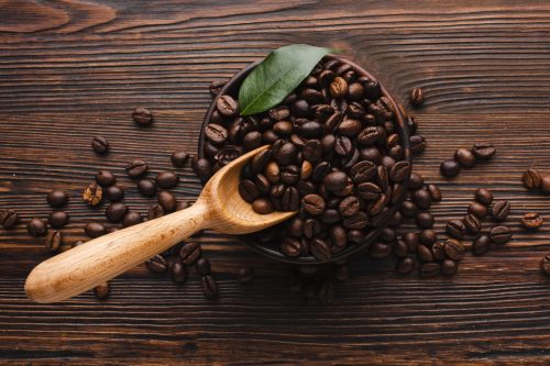 coffee-beans-wooden-spoon-wooden-table